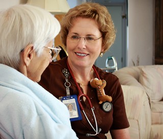 Nurse and older female patient