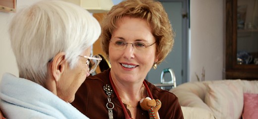 Nurse and older female patient
