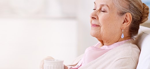 Older woman drinking tea