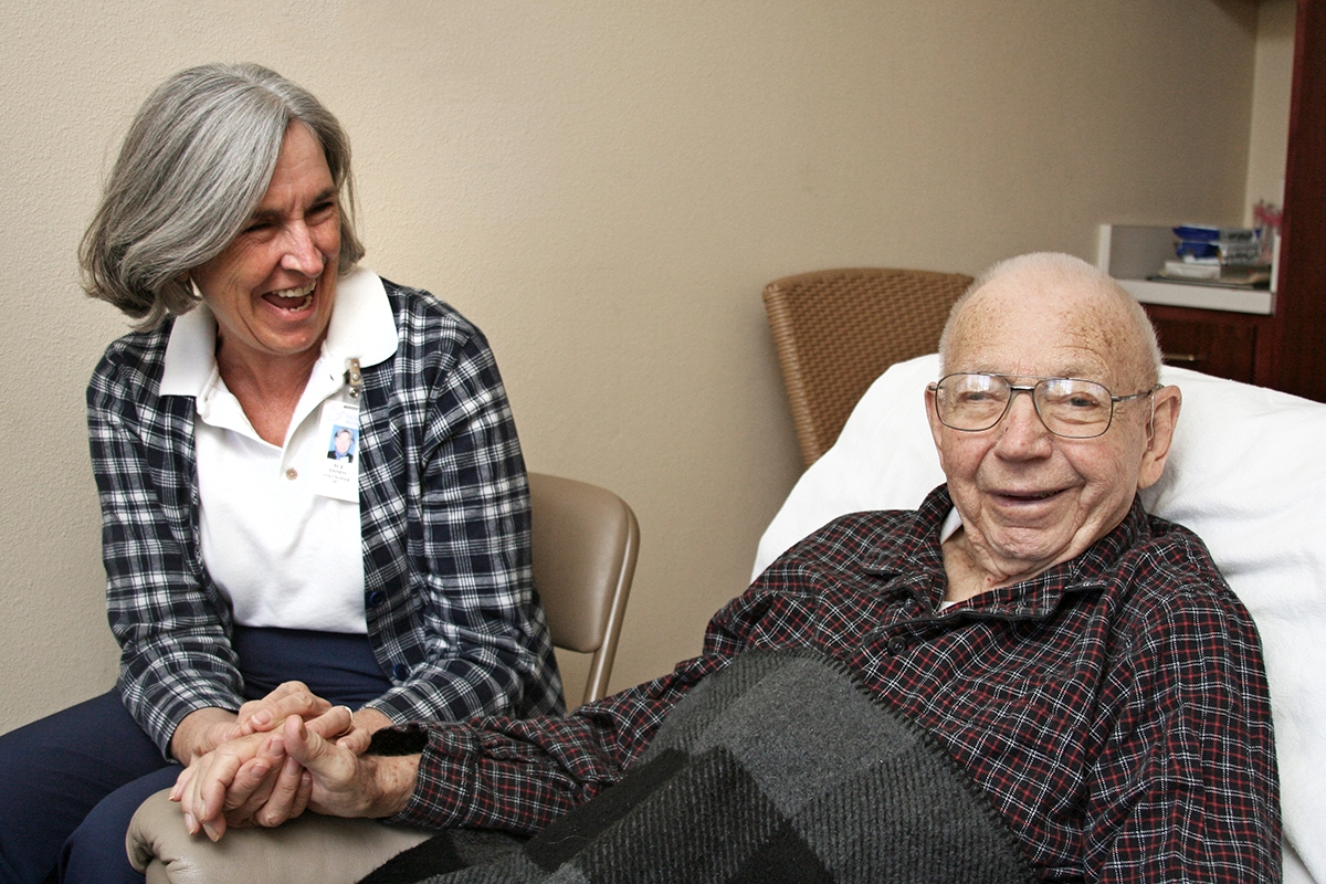 Volunteer Sue Danesi with a patient