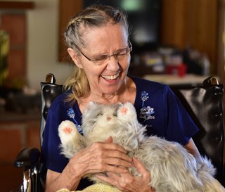 Dee with her mechanical cat. 