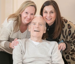 Social workes enjoys her visits with patient John Tracey