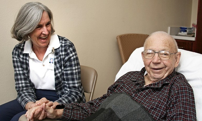 Volunteer Sue Danesi with a patient