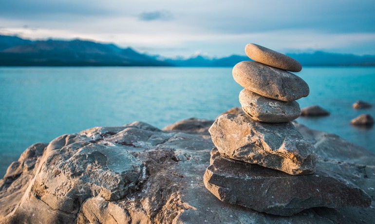 Rock stack on the shore of a lake