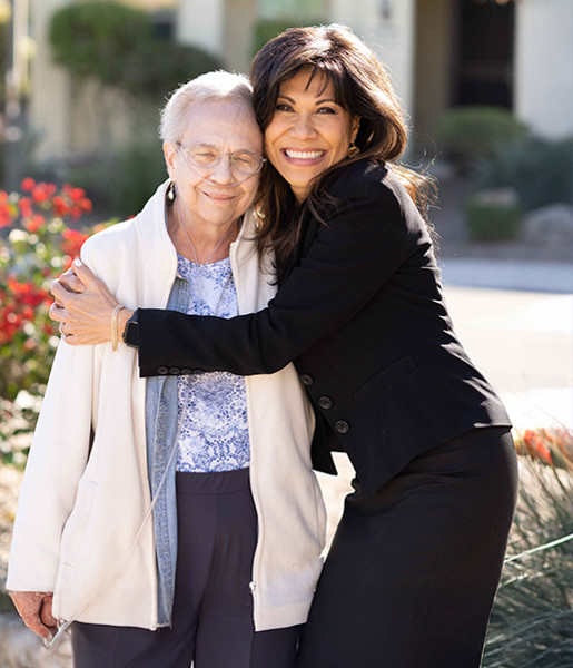 Lin Sue Flood hugging patient Diane